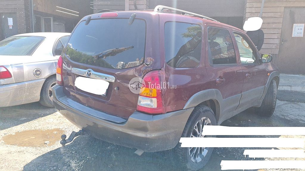 Фото Mazda Tribute 6