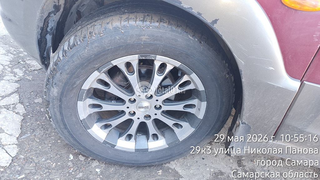 Фото Mazda Tribute 10