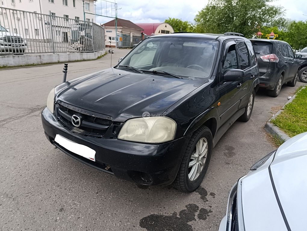 Фото Mazda Tribute 4