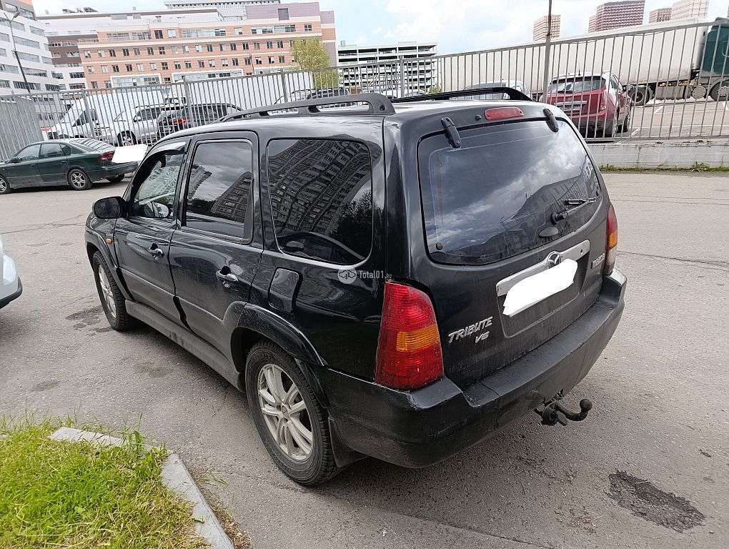 Фото Mazda Tribute 8