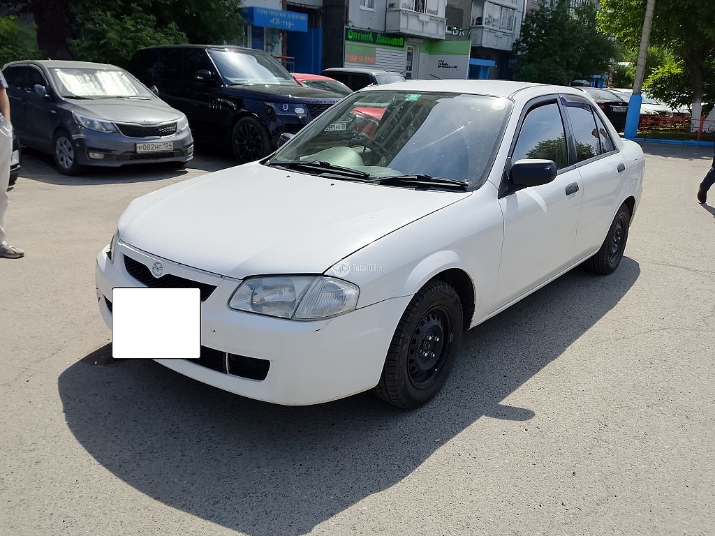 Фото Mazda Familia 4