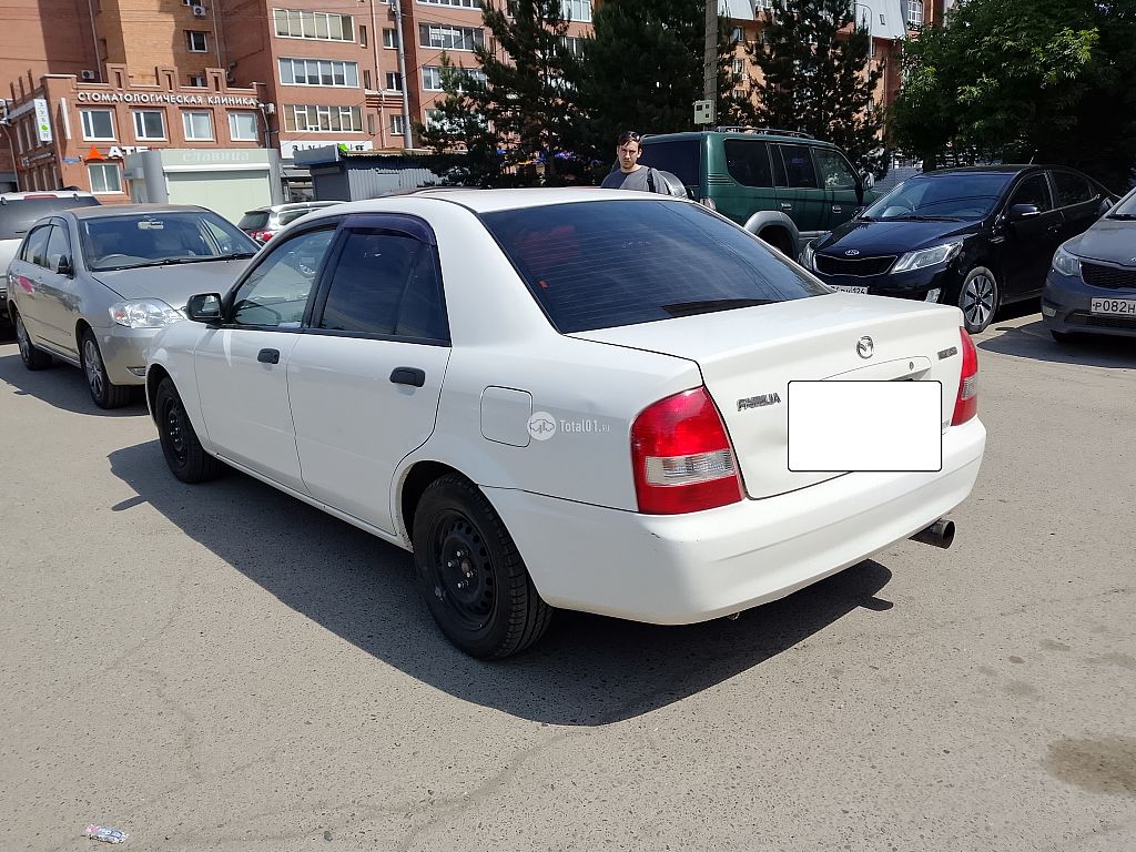 Фото Mazda Familia 6