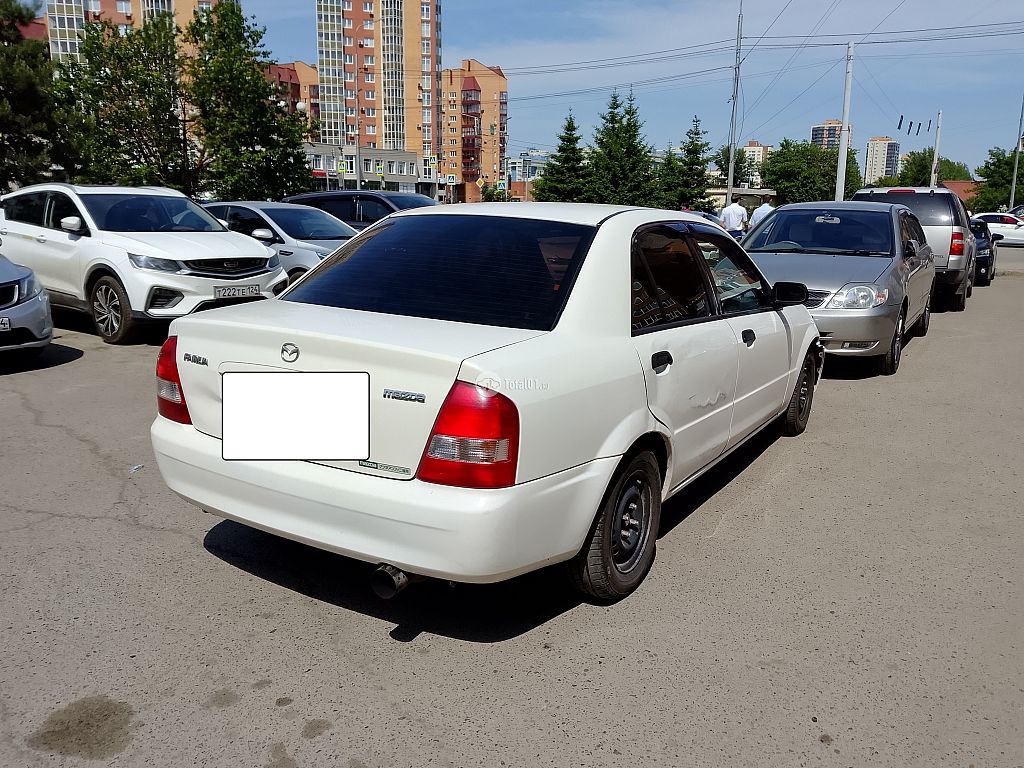 Фото Mazda Familia 8