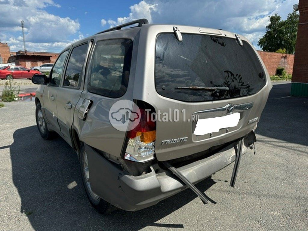 Фото Mazda Tribute 8