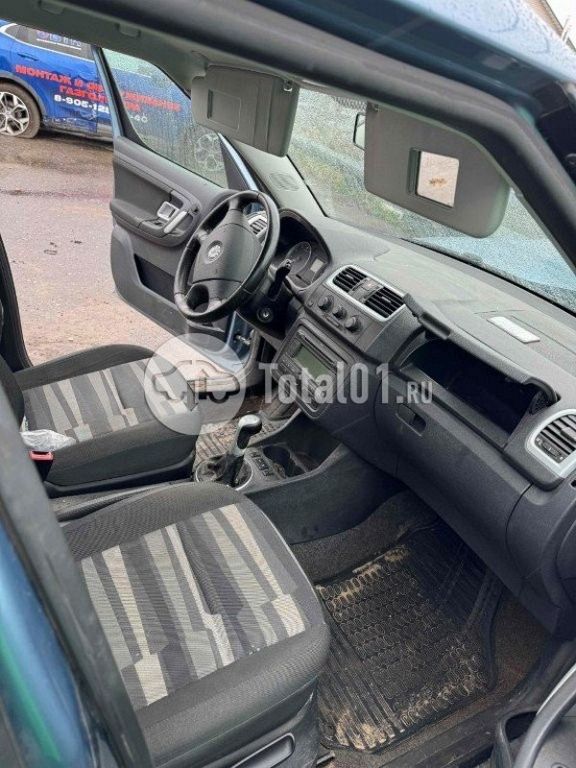 Фото Skoda Roomster 108