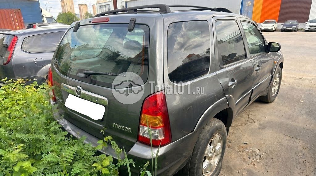 Фото Mazda Tribute 8