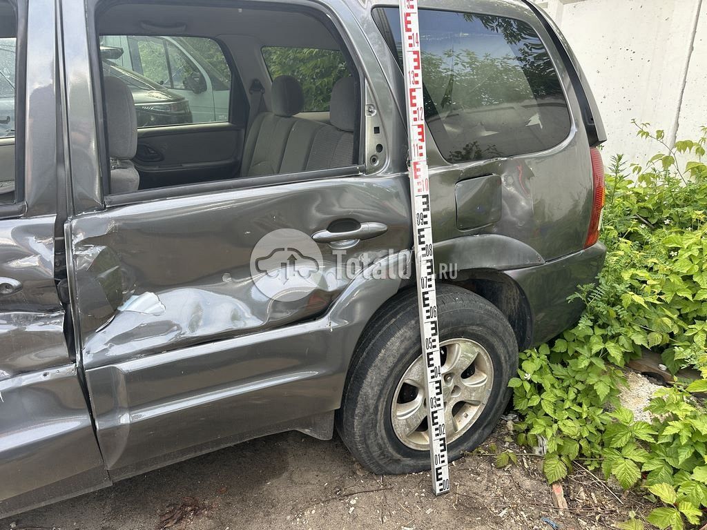 Фото Mazda Tribute 10