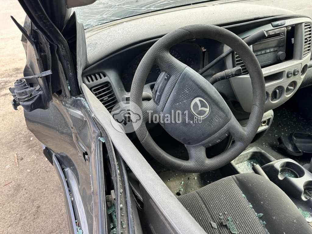 Фото Mazda Tribute 20