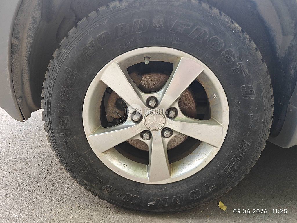 Фото Mazda Tribute 4