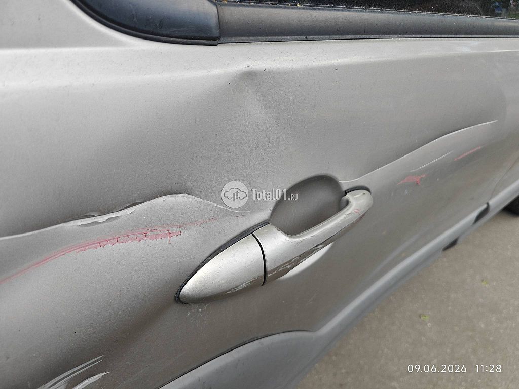 Фото Mazda Tribute 14