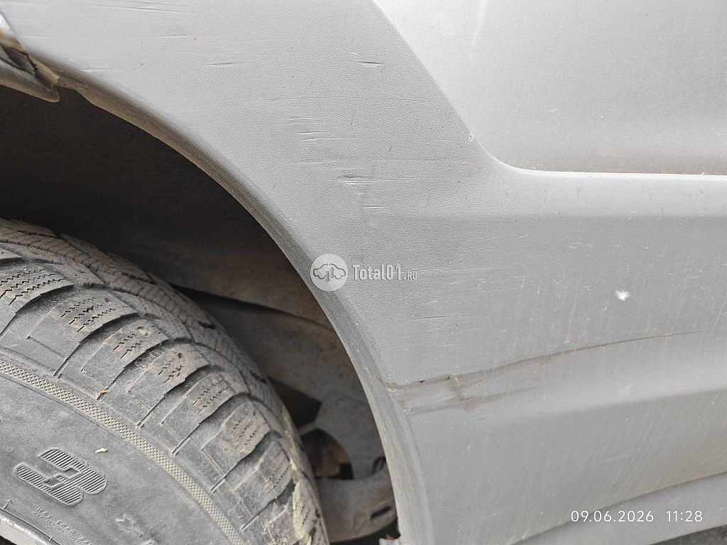 Фото Mazda Tribute 20