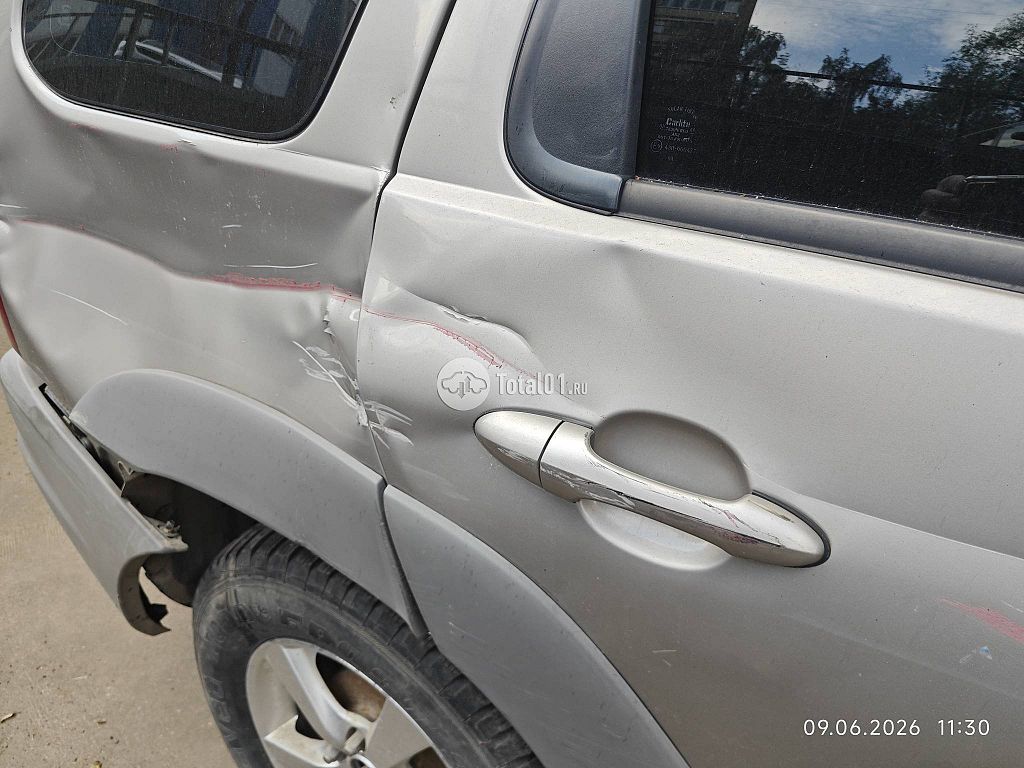 Фото Mazda Tribute 46