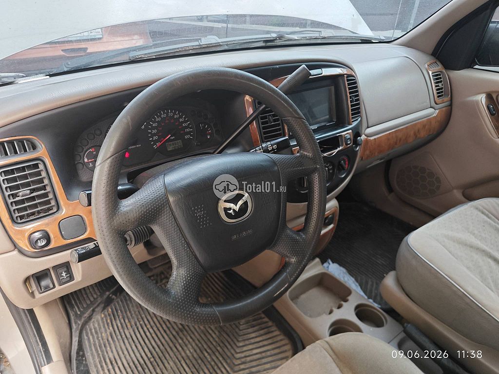 Фото Mazda Tribute 60