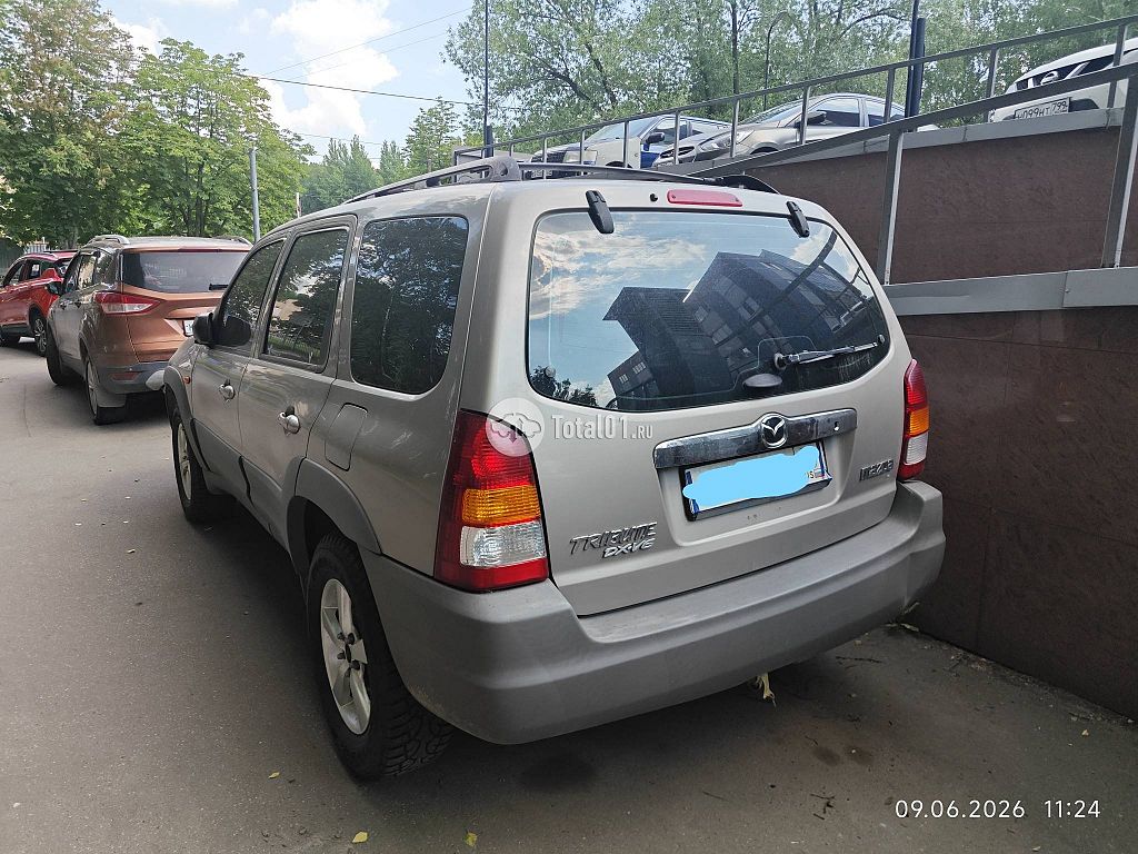 Фото Mazda Tribute 68