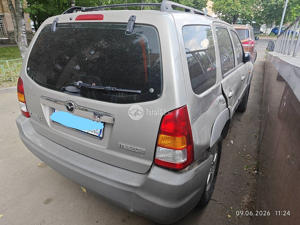 Фото Mazda Tribute 70