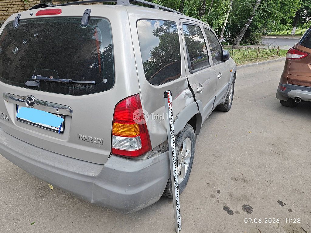 Фото Mazda Tribute 74