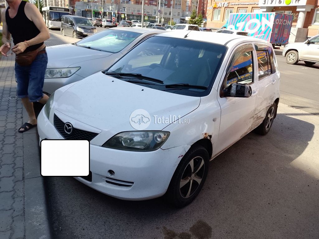 Фото Mazda Demio 4