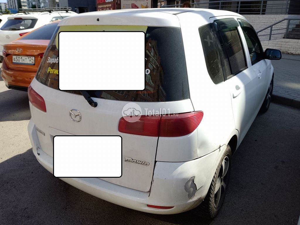 Фото Mazda Demio 8