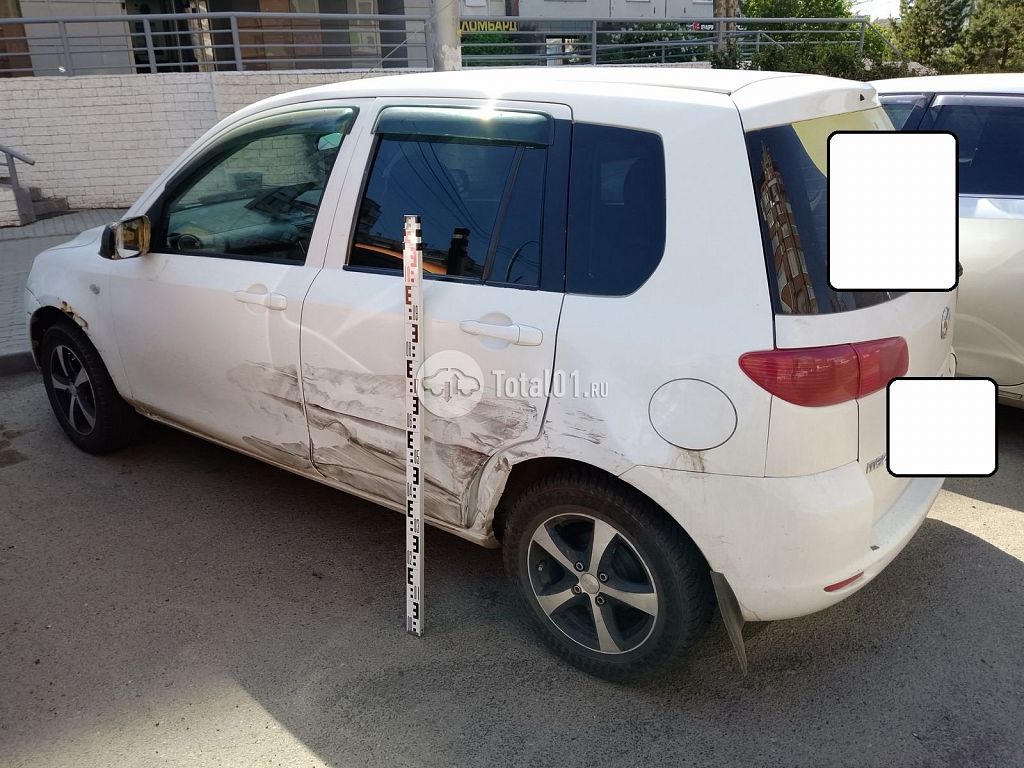 Фото Mazda Demio 10