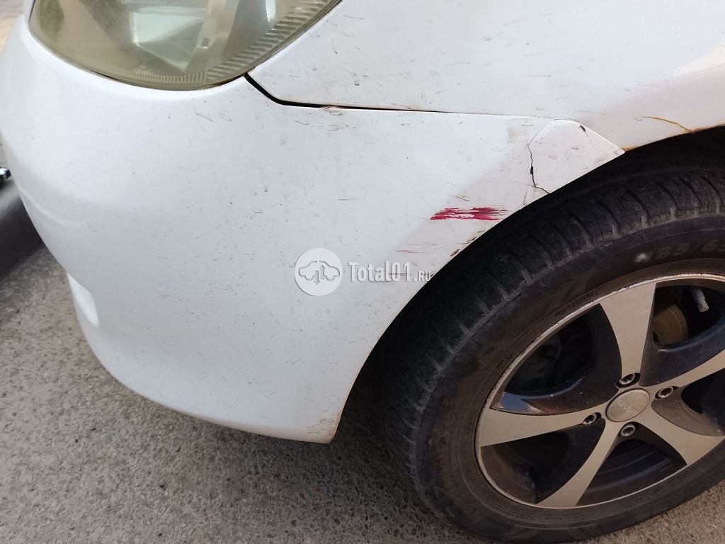 Фото Mazda Demio 12