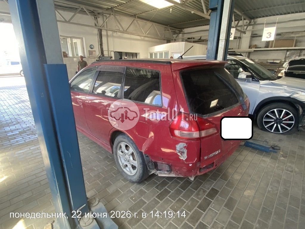 Фото Nissan Wingroad 8
