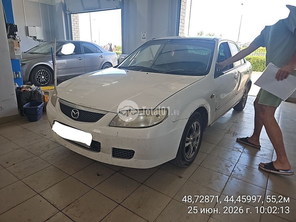 Фото Mazda Familia 4