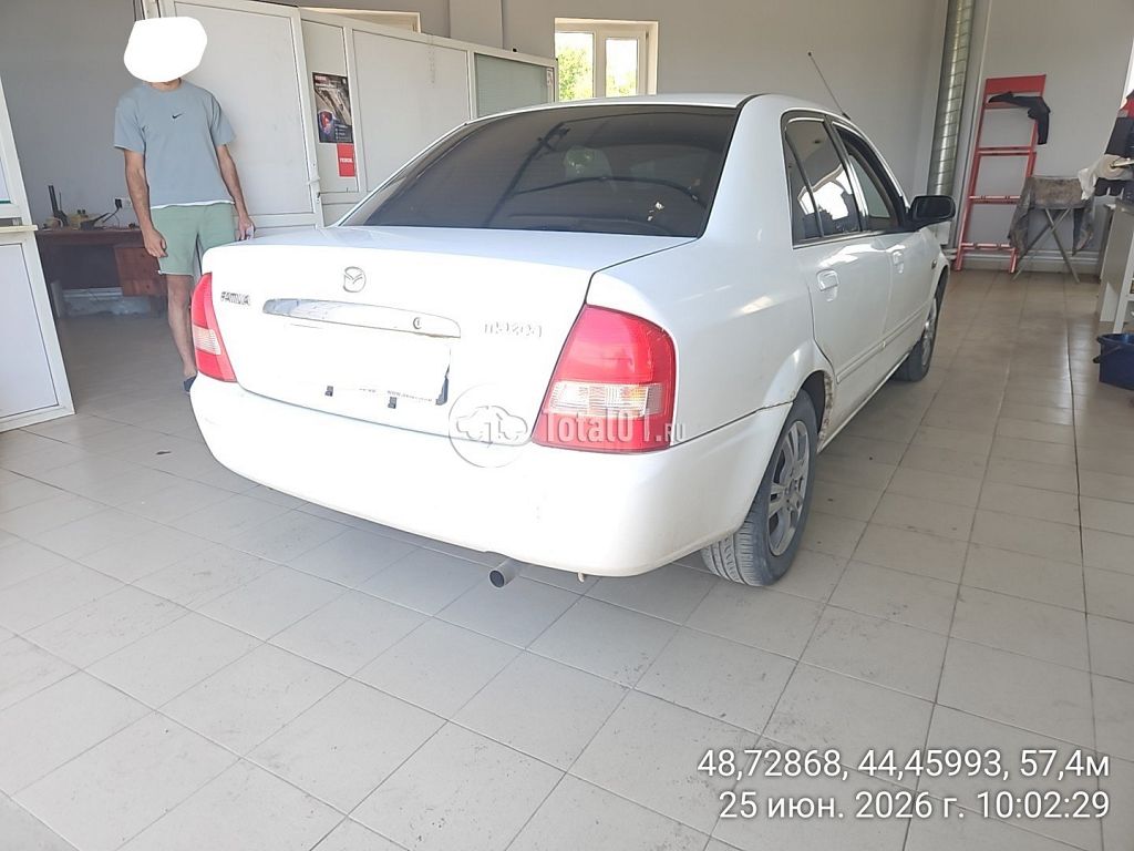 Фото Mazda Familia 8