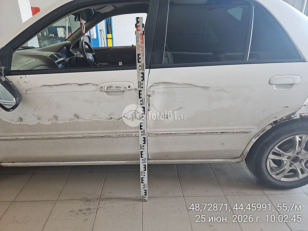 Фото Mazda Familia 12
