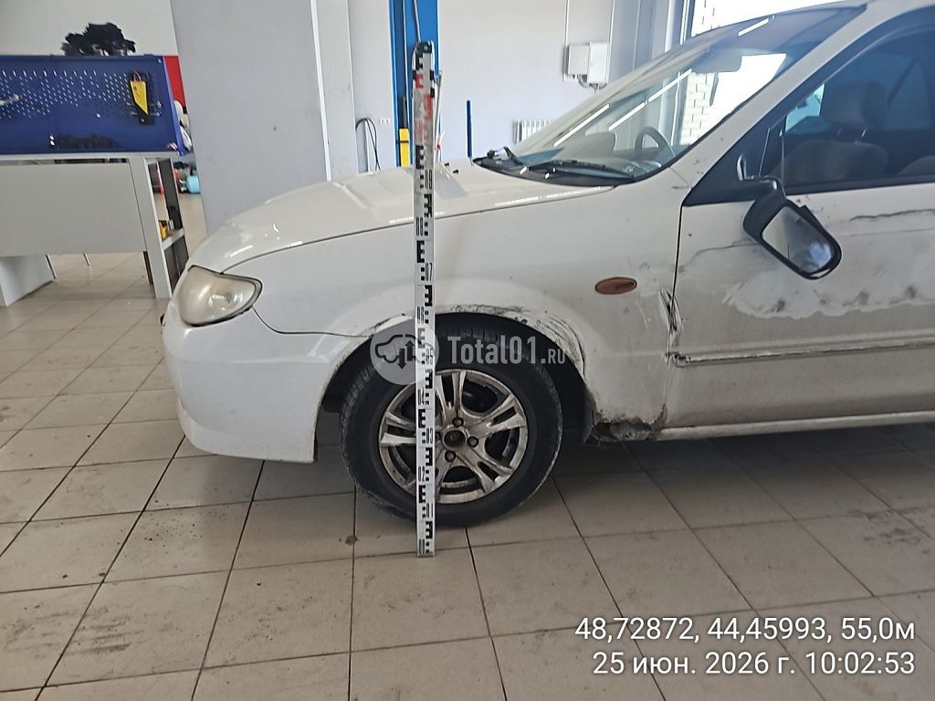 Фото Mazda Familia 14