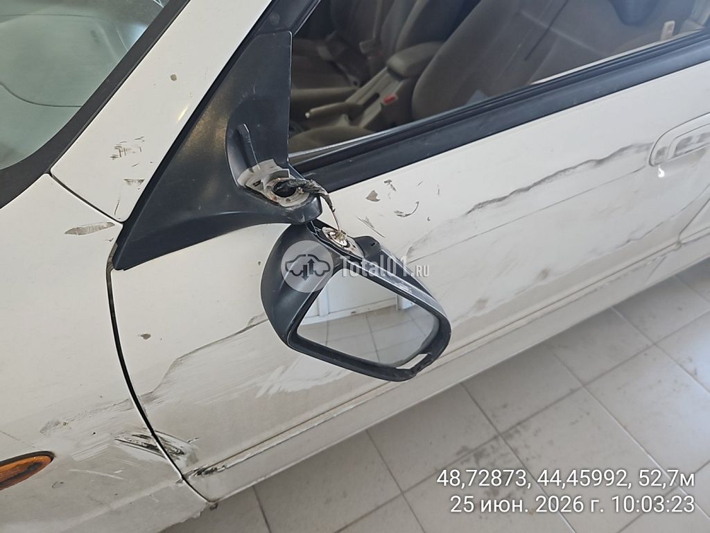 Фото Mazda Familia 18
