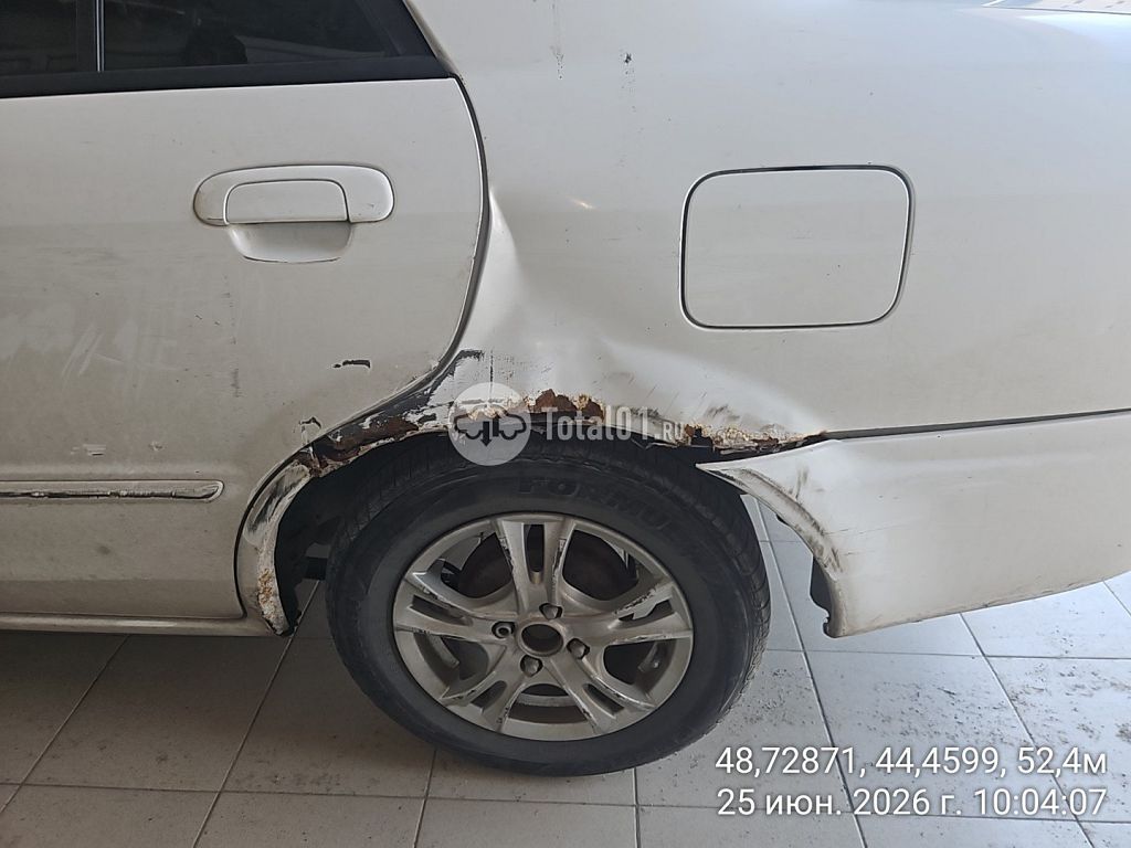 Фото Mazda Familia 24