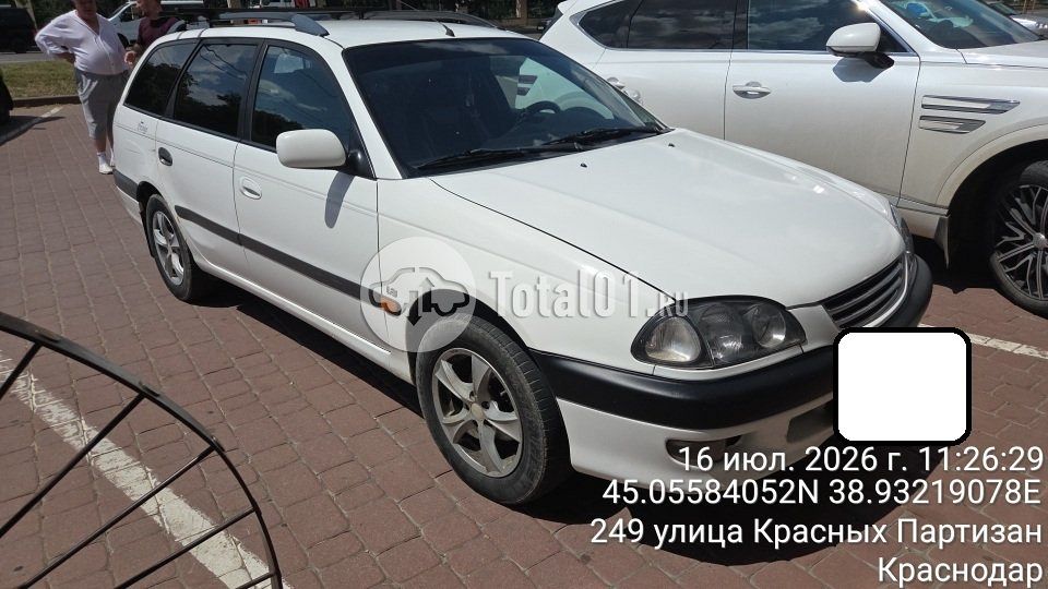 Фото Toyota Avensis 14