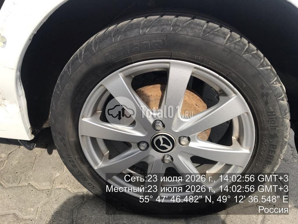 Фото Mazda 2 24