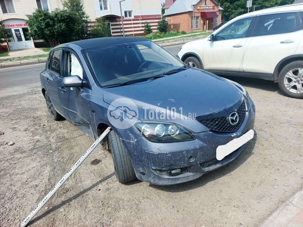 Фото Mazda 3 4