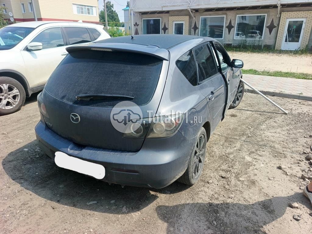 Фото Mazda 3 6