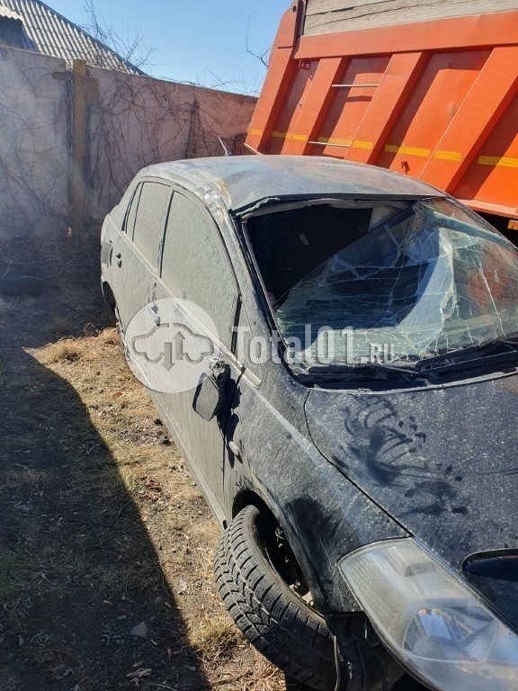Фото Nissan Tiida 6