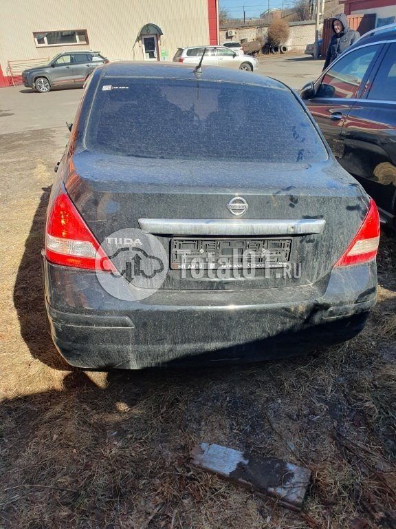 Фото Nissan Tiida 8
