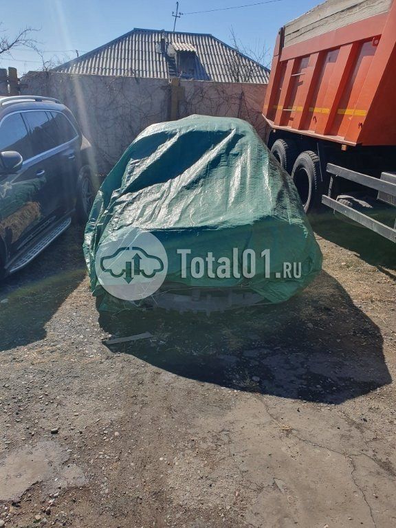 Фото Nissan Tiida 10