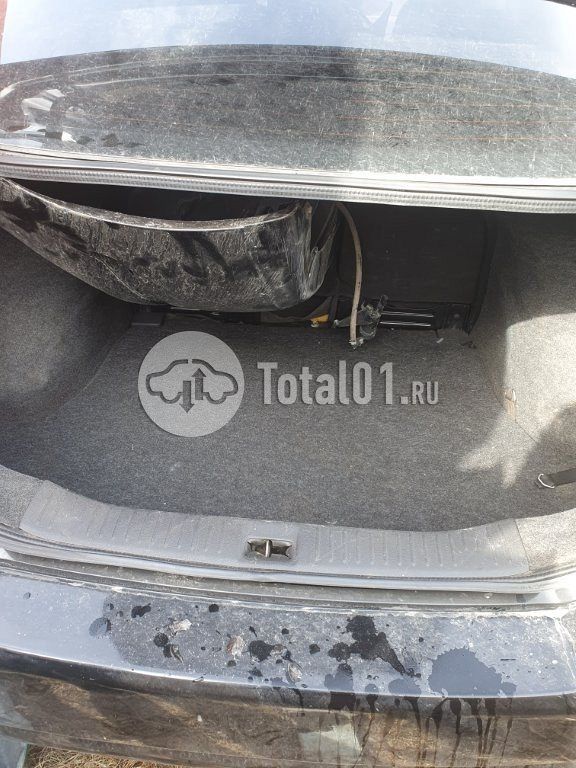 Фото Nissan Tiida 14
