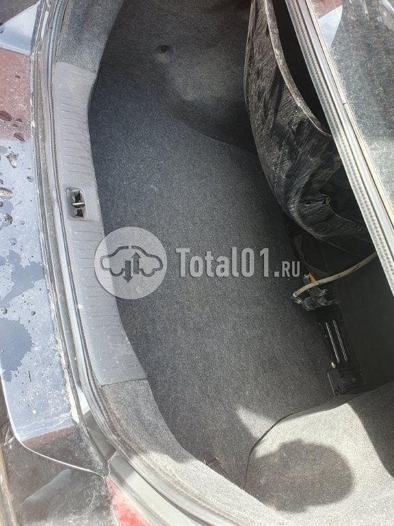 Фото Nissan Tiida 16