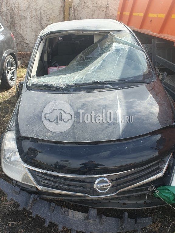 Фото Nissan Tiida 40