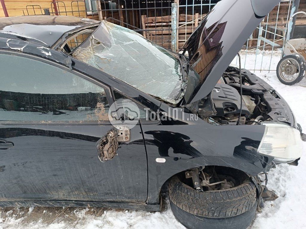 Фото Nissan Tiida 54