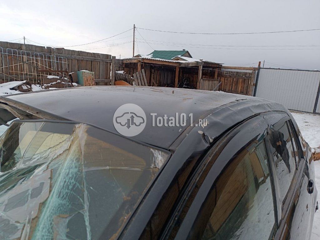 Фото Nissan Tiida 60
