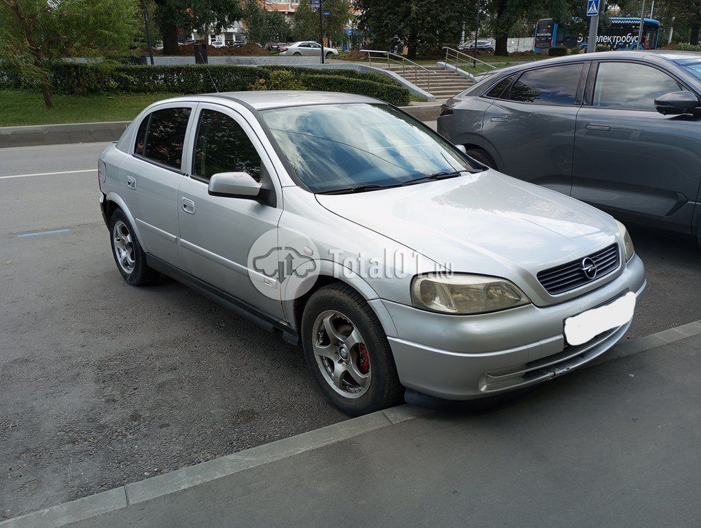 Фото Opel Astra 4
