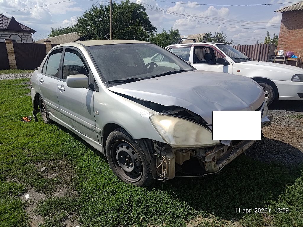 Фото Mitsubishi Lancer 12