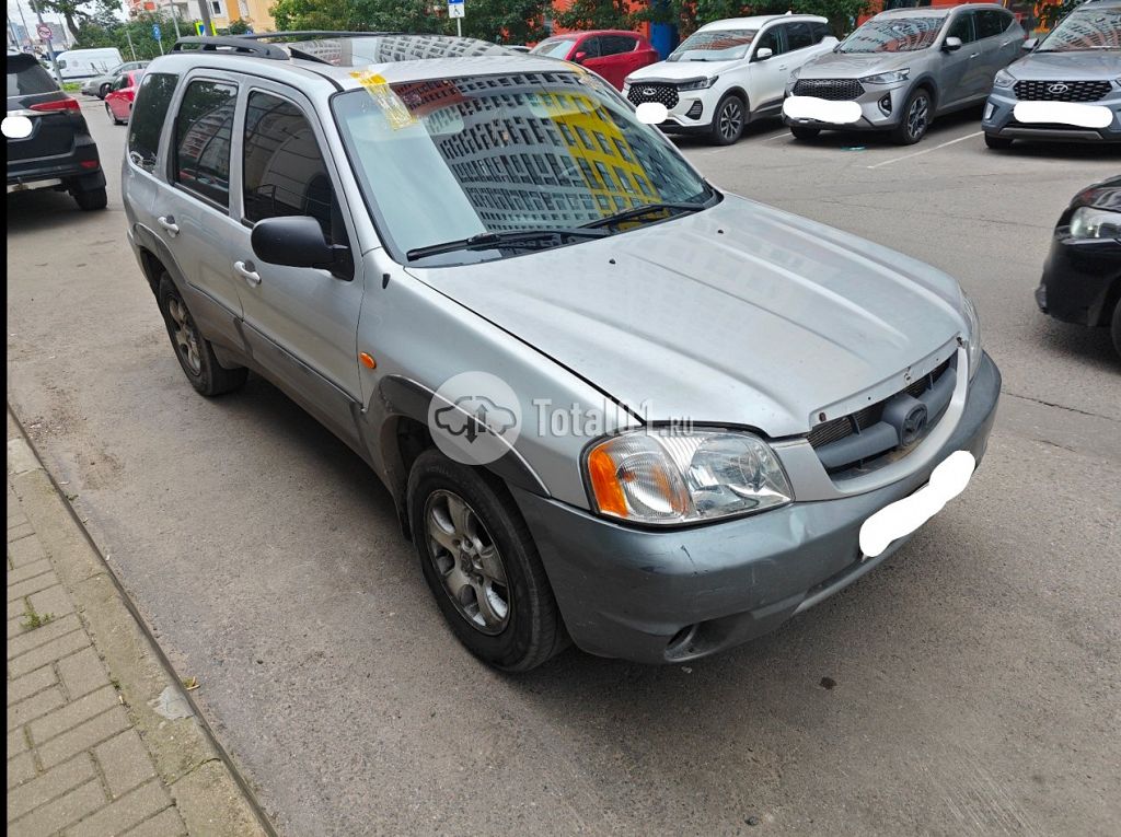 Фото Mazda Tribute 2