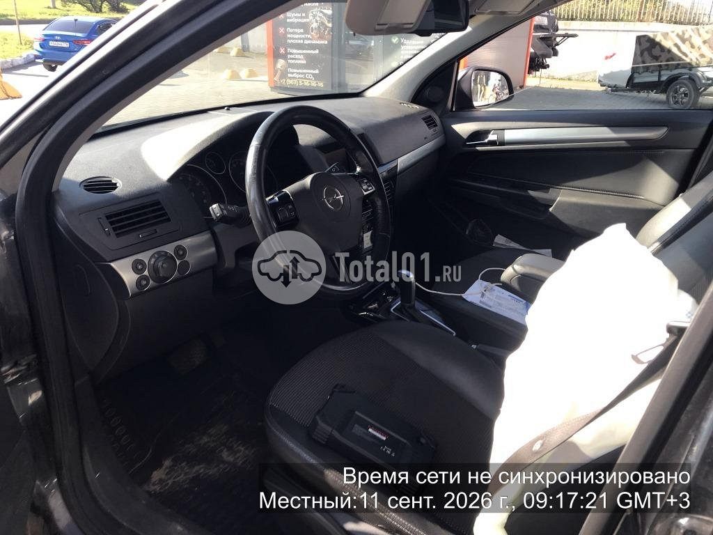Фото Opel Astra 12