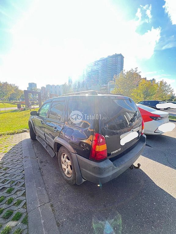 Фото Mazda Tribute 2