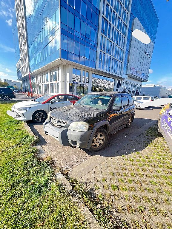 Фото Mazda Tribute 4