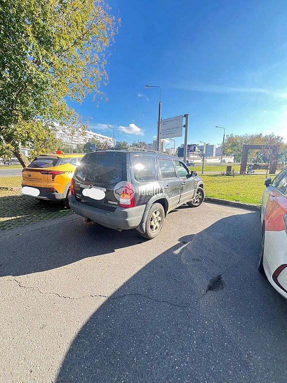 Фото Mazda Tribute 8